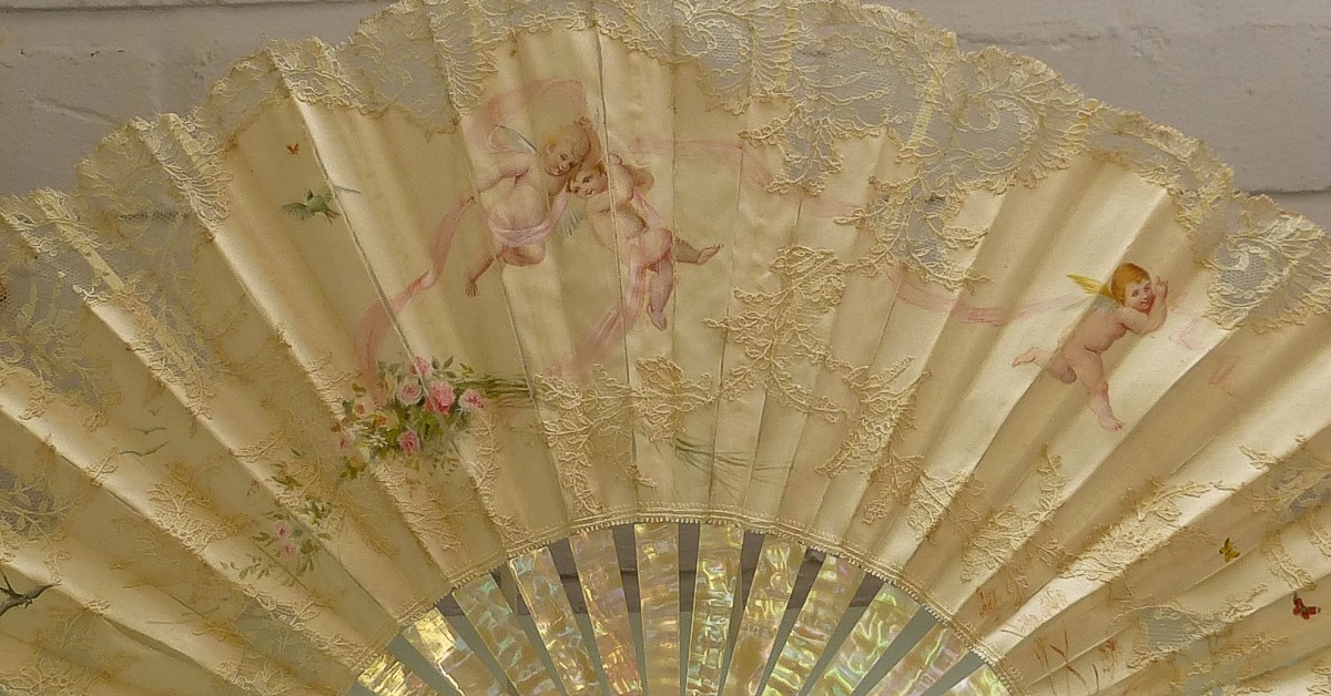 Antique-French-silk-lace-mother of pearl-fan-cherub-putti